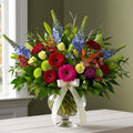 vibrant celebration bouquet with ribbon | luxe macon flower arrangement macon ga florist